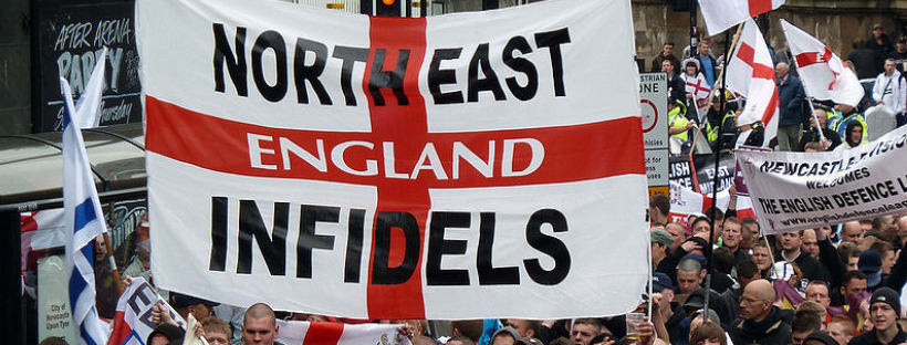 Rally in Europe with flag stating "NorthEast England Infidels"