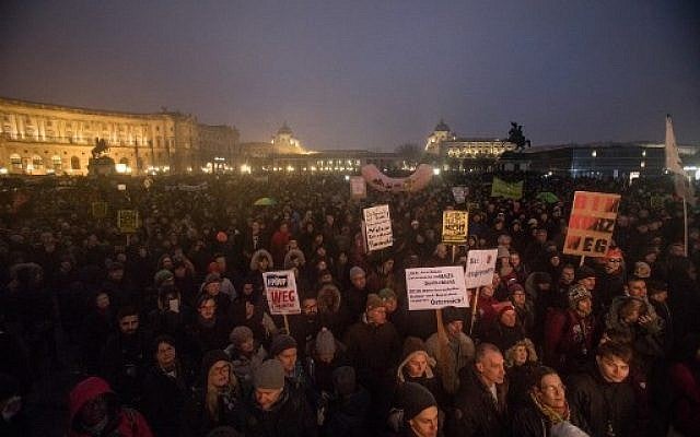 Protesters take part in a demonstration against the new Austrian government in Vienna, January 13.