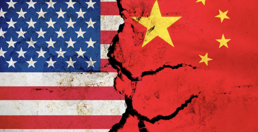 A flag of China on the right and a flag of the U.S on the left with cracks appearing at the point of cotact