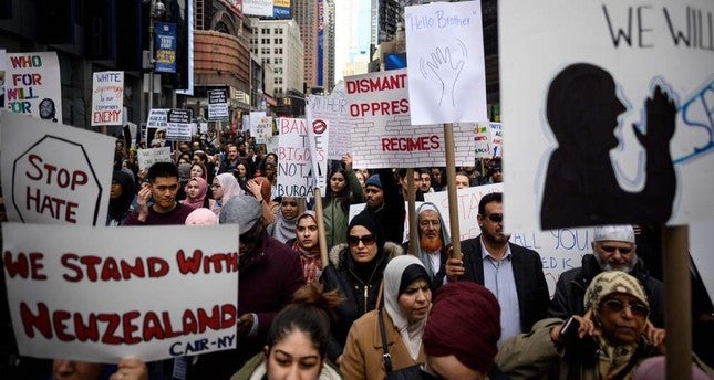 Demonstrators take part in a protest against growing Islamophobia, white supremacy and anti-immigrant bigotry following the New Zealand mosque attacks, at in Times Square, New York City, the U.S.