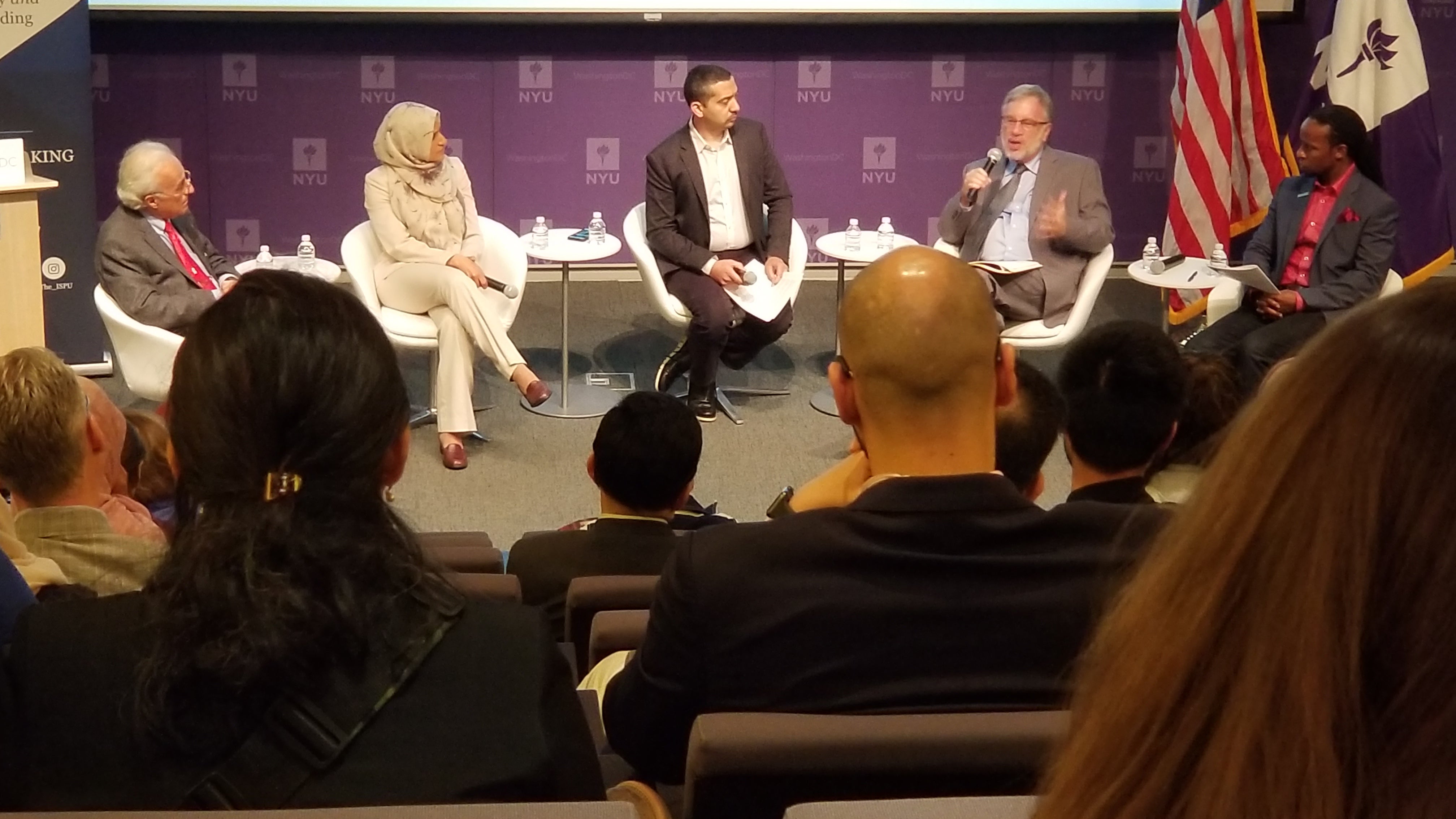 Panel discussion around a table