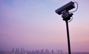 A CCTV camera looks at a city in the distance