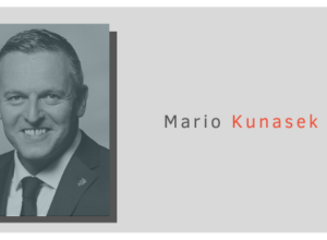 Banner Image with grey and red accents of Mario Kunasek